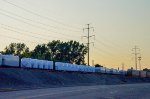 QTTX & KRL Flat cars with load in the yard